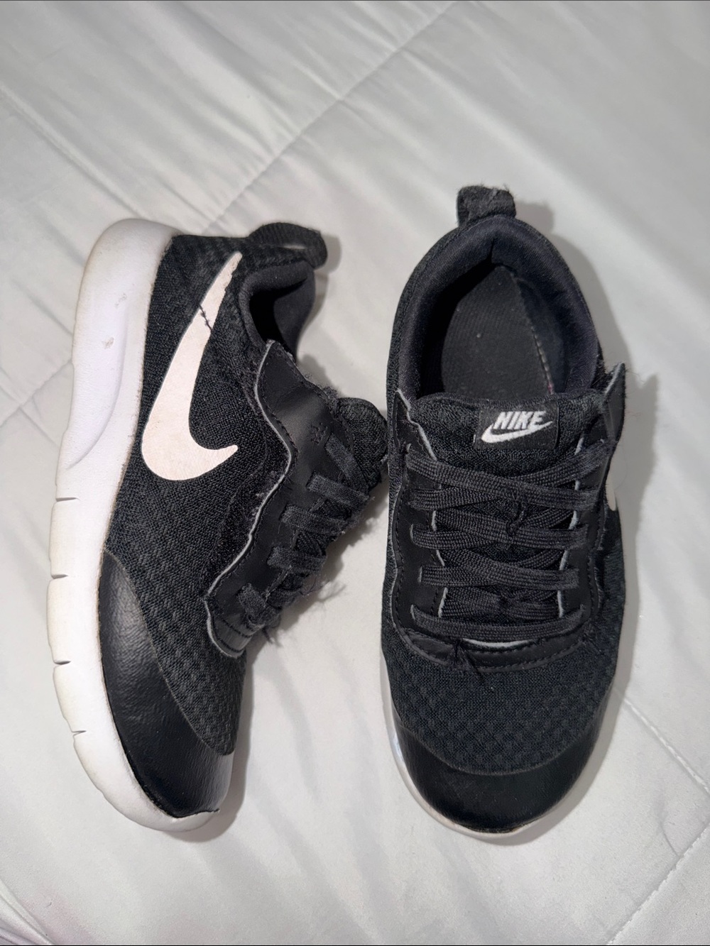 Nike Kids Black Sneakers with White Swoosh